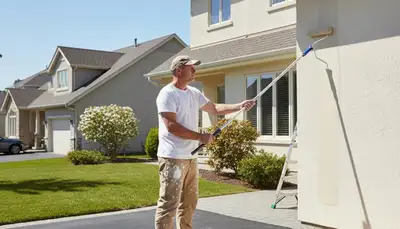Boston house painter preparing exterior home for durable, weather-resistant painting in Boston, MA